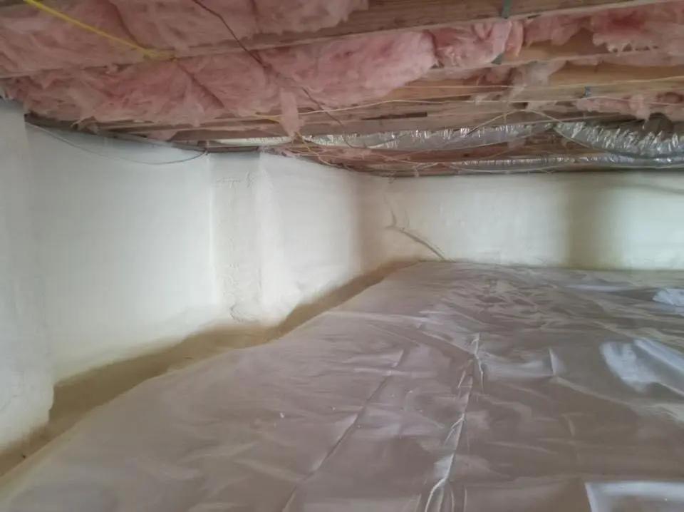 Crawl space encapsulation with closed-cell spray foam for Storm Damage Roof Repair in East Grand Forks
